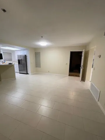 a big room with closet and a bathroom