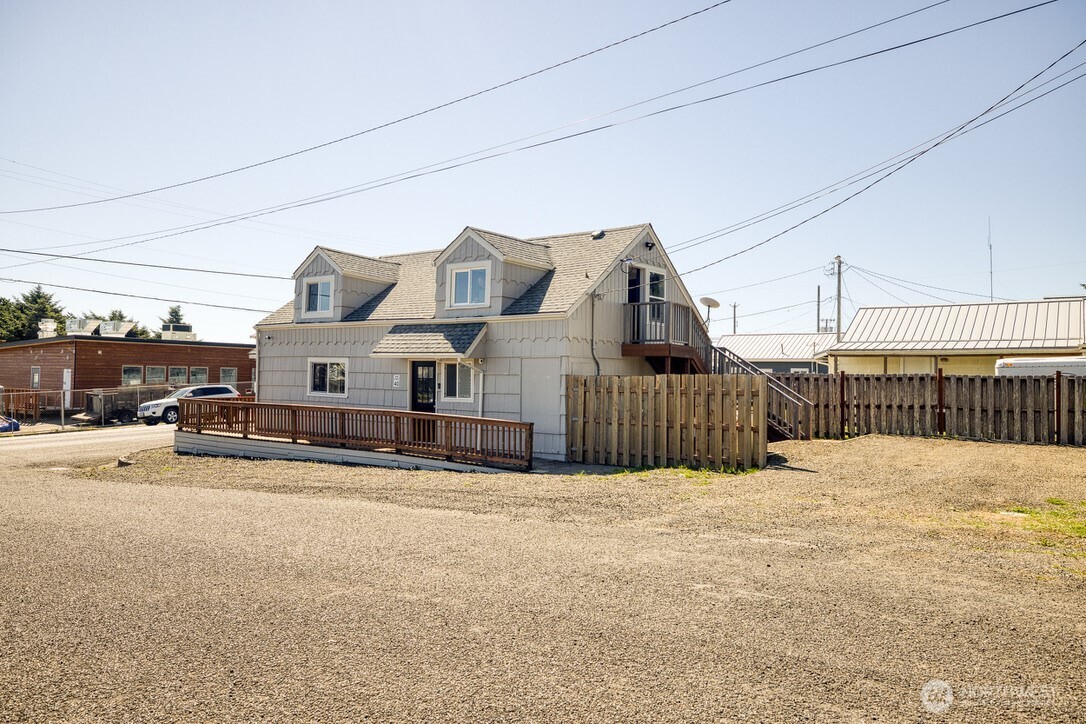 40 Main Street Pacific Beach, WA 98571 - Photo 2 of 40 a view of a house with a snow in the background