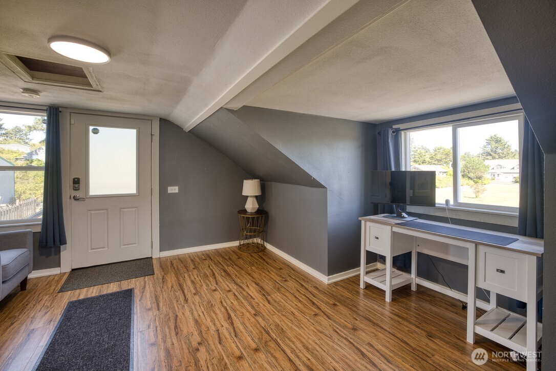 40 Main Street Pacific Beach, WA 98571 - Photo 25 of 40 a bedroom with a bed and a window