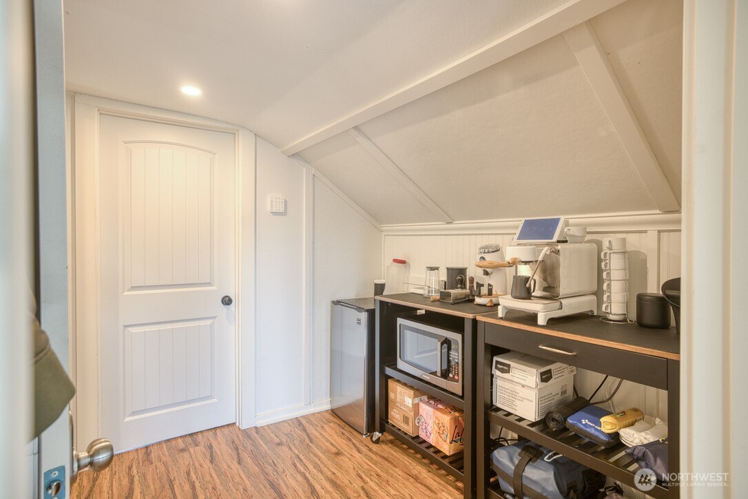 40 Main Street Pacific Beach, WA 98571 - Photo 27 of 40 a view of a dining room with furniture and wooden floor