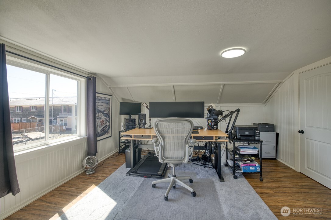 40 Main Street Pacific Beach, WA 98571 - Photo 29 of 40 a bed room with a bed and a window