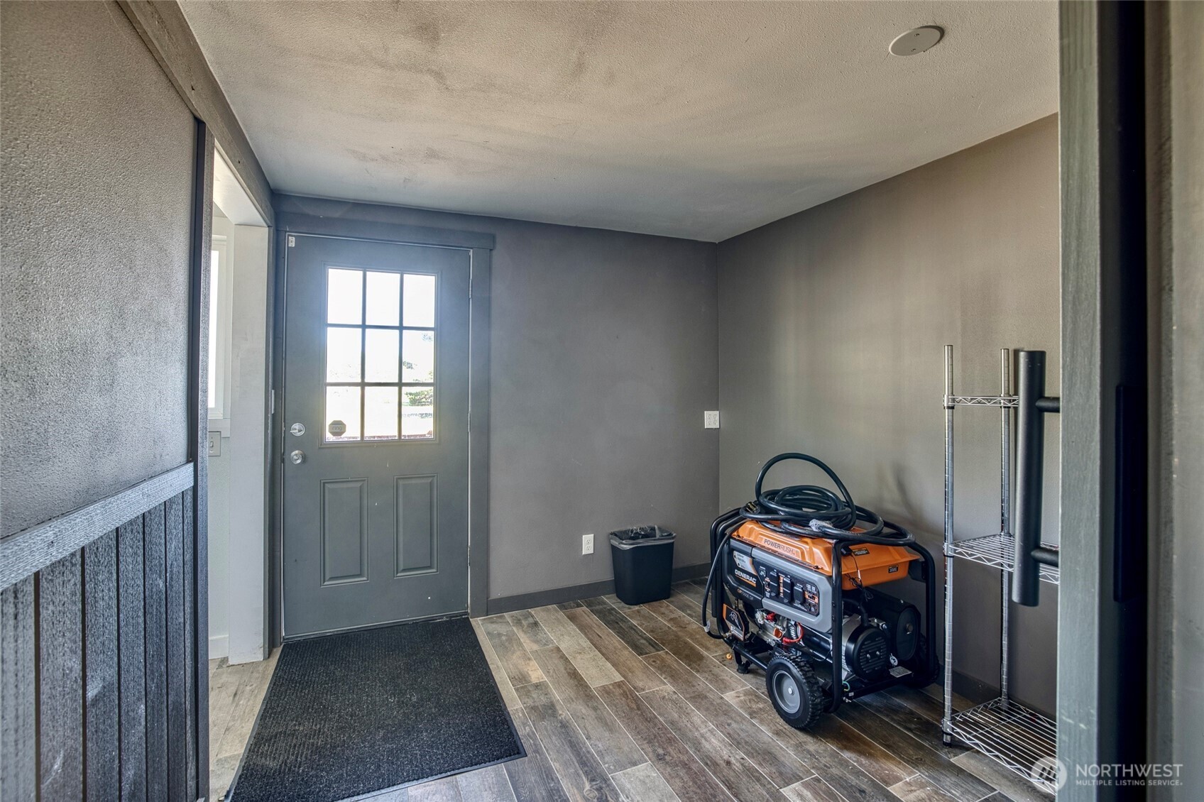 40 Main Street Pacific Beach, WA 98571 - Photo 31 of 40 a view of a bedroom with a bed and a window
