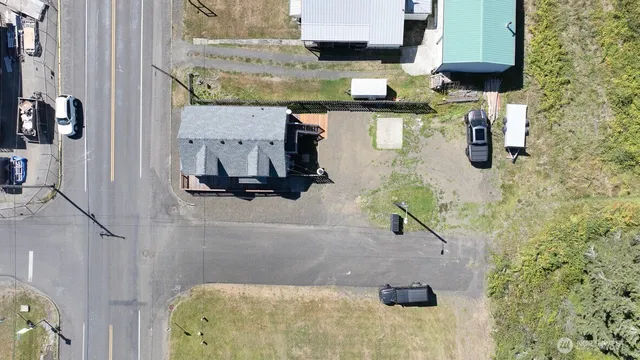 a bathroom with a granite countertop sink