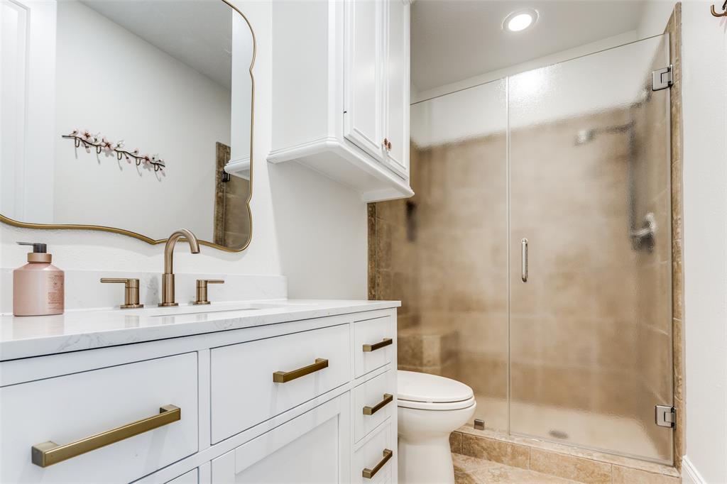 4111 Angling Lane Spring, TX 77386 - Photo 15 of 27 Full bath featuring vanity, a stall shower, and recessed lighting