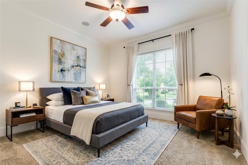 4111 Angling Lane Spring, TX 77386 - Photo 16 of 27 Bedroom featuring light colored carpet, ornamental molding, and a ceiling fan (Digital Staging Used)