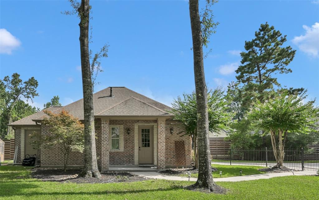 4111 Angling Lane Spring, TX 77386 - Photo 21 of 27 View of front of house featuring brick siding and roof with shingles