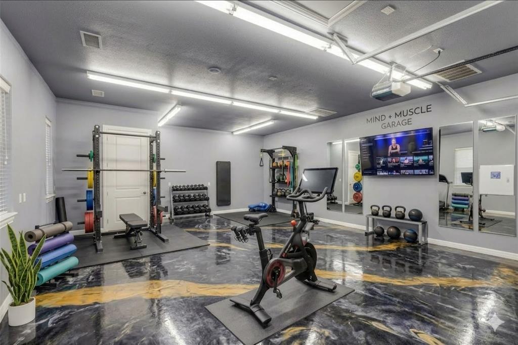 4111 Angling Lane Spring, TX 77386 - Photo 22 of 27 Exercise room with a textured ceiling and baseboards (Digital Rendering and Staging Used)