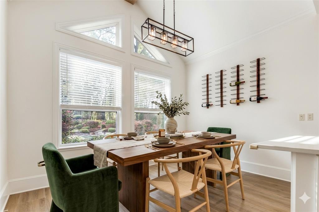 4111 Angling Lane Spring, TX 77386 - Photo 9 of 27 Dining space featuring light wood finished floors and lofted ceiling (Digital Staging Used)