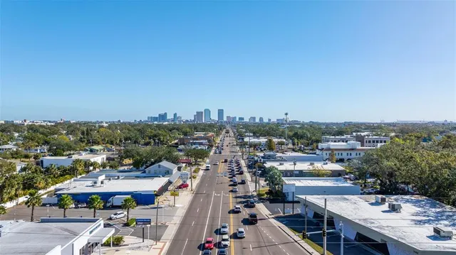 a view of a swimming pool with a patio