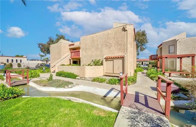 an aerial view of a house having patio