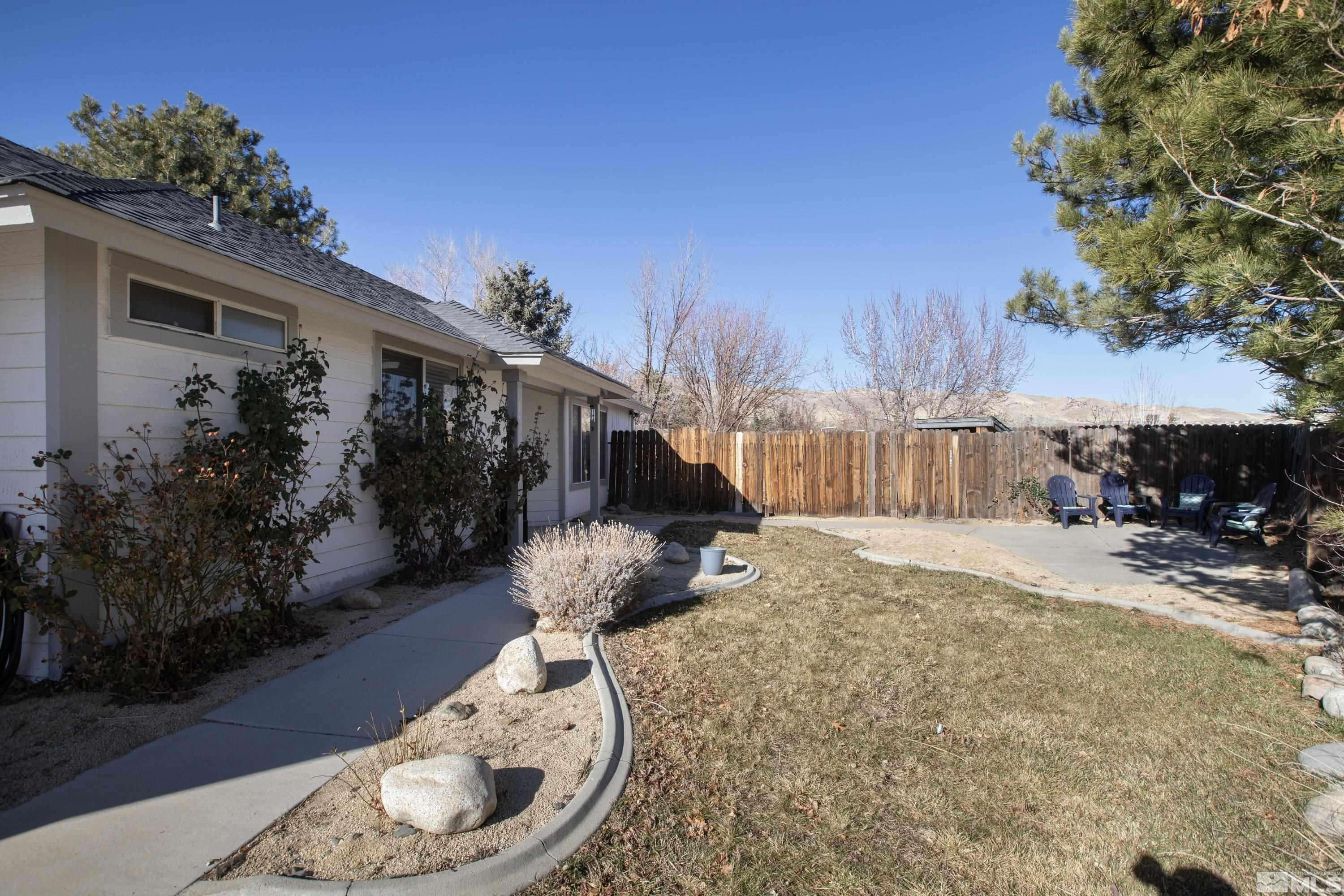 1121 Shadelands Court Reno, NV 89523 - Photo 2 of 38 a house view with a backyard space