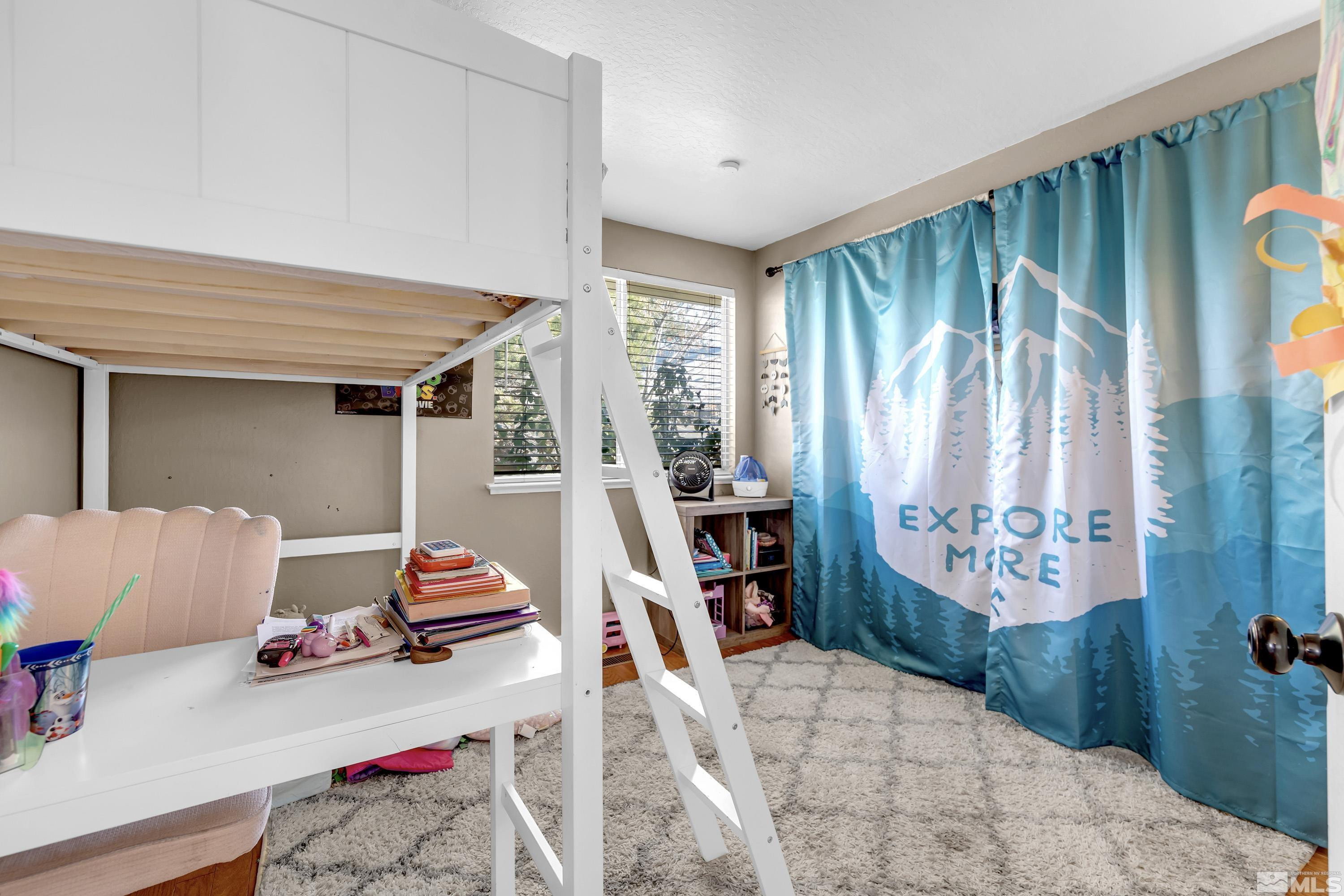 1121 Shadelands Court Reno, NV 89523 - Photo 23 of 38 a bedroom with a bed and a window
