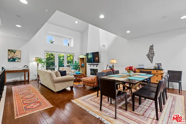 a view of a livingroom with furniture and a window