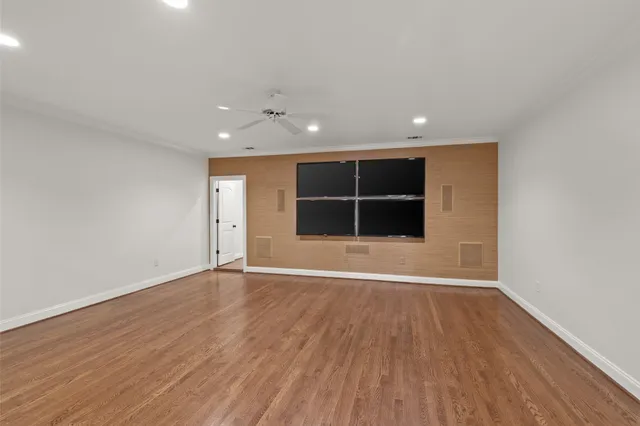 a bathroom with a granite countertop sink vanity and mirror