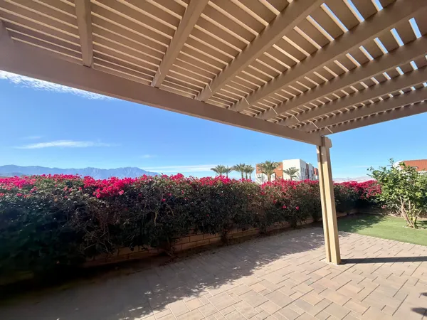 a view of a pathway with a yard