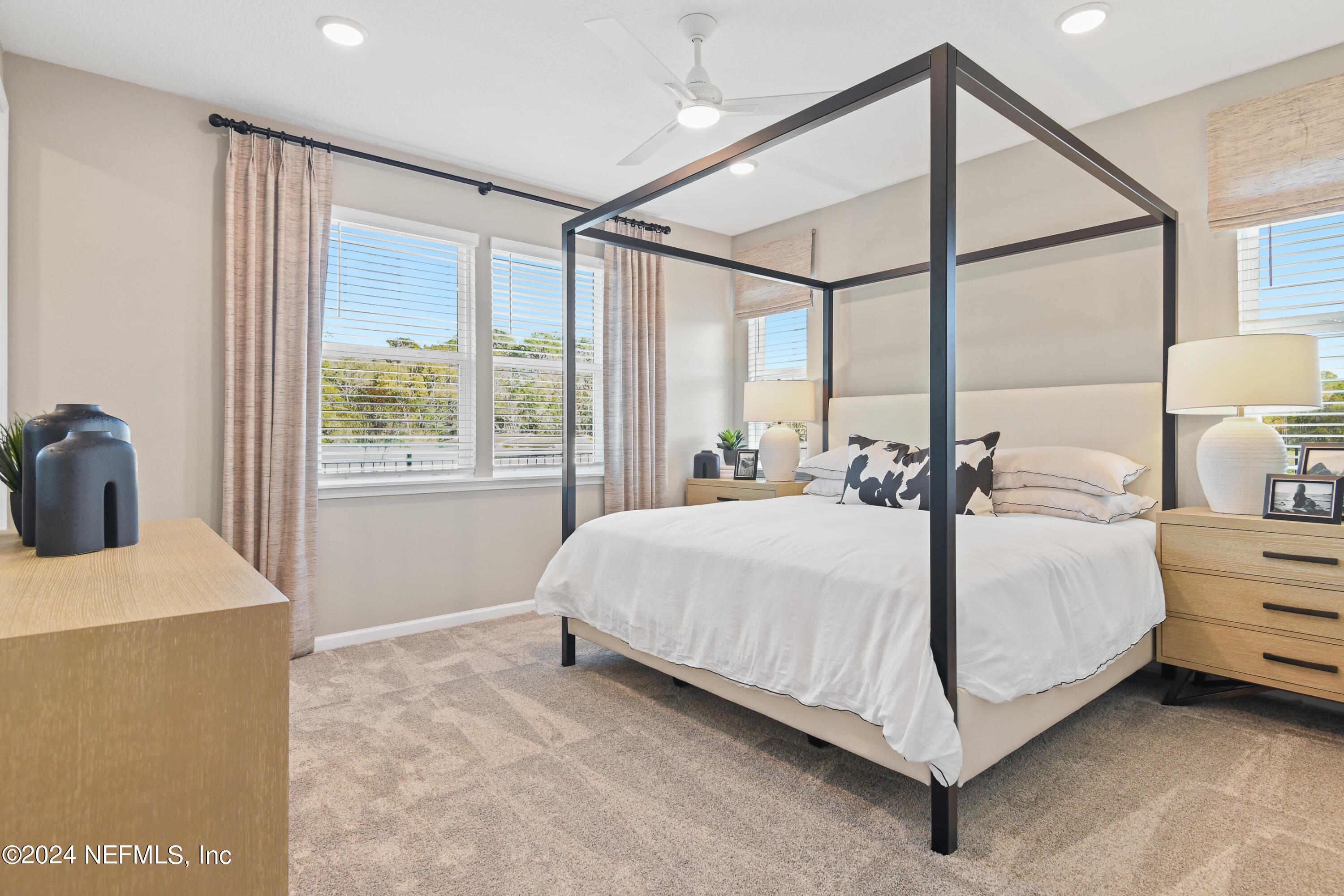 333 Cedar Elm Way St. Augustine, FL 32092 - Photo 11 of 24 a bed room with a bed and a table