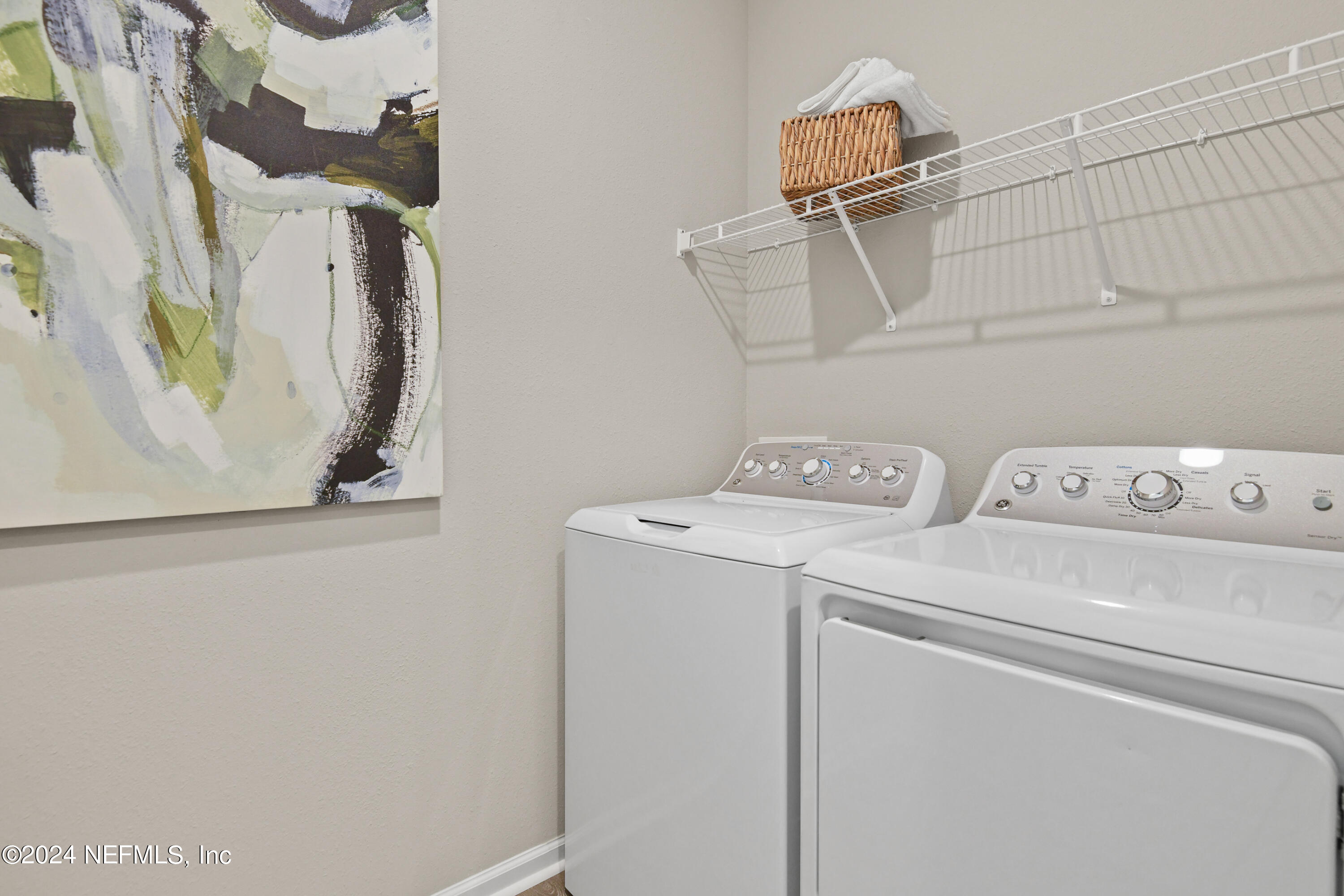 333 Cedar Elm Way St. Augustine, FL 32092 - Photo 13 of 24 a utility room with dryer and washer