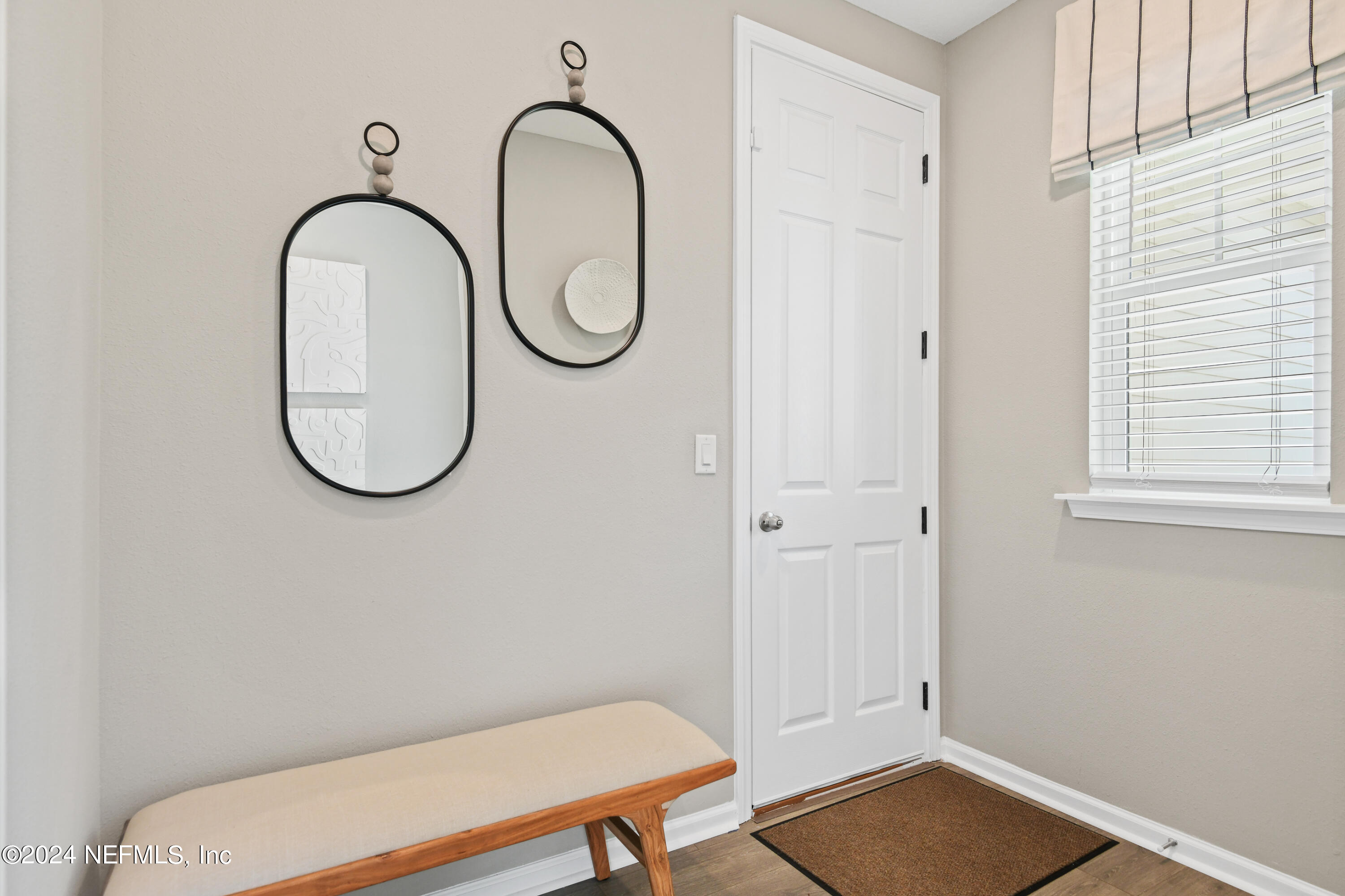 333 Cedar Elm Way St. Augustine, FL 32092 - Photo 3 of 24 a bathroom with a sink and a mirror