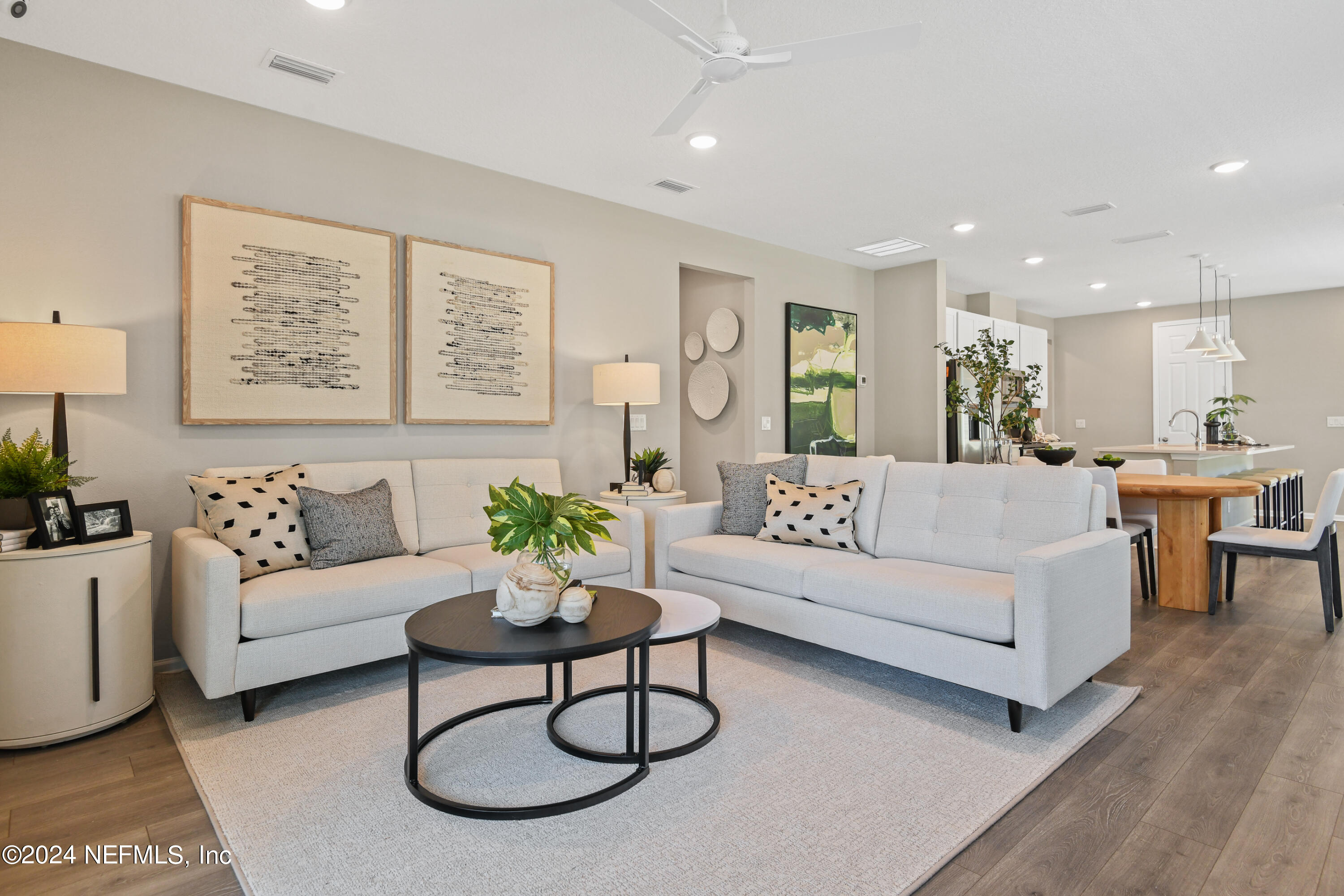 333 Cedar Elm Way St. Augustine, FL 32092 - Photo 10 of 24 a living room with furniture kitchen view and a table