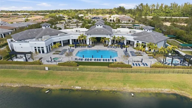 a view of a swimming pool with a lake view