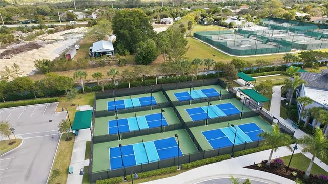 a view of swimming pool with outdoor seating and yard