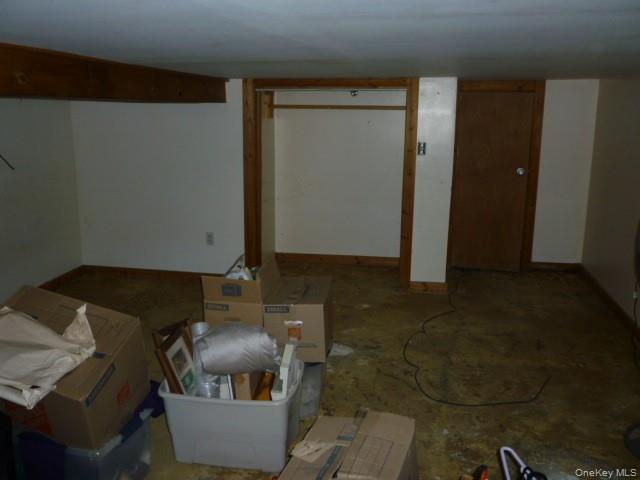 11 Hazel Drive Patterson, NY 12563 - Photo 19 of 20 a living room with a couch and a stove