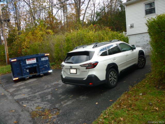 11 Hazel Drive Patterson, NY 12563 - Photo 5 of 20 a front view of a house with a garden