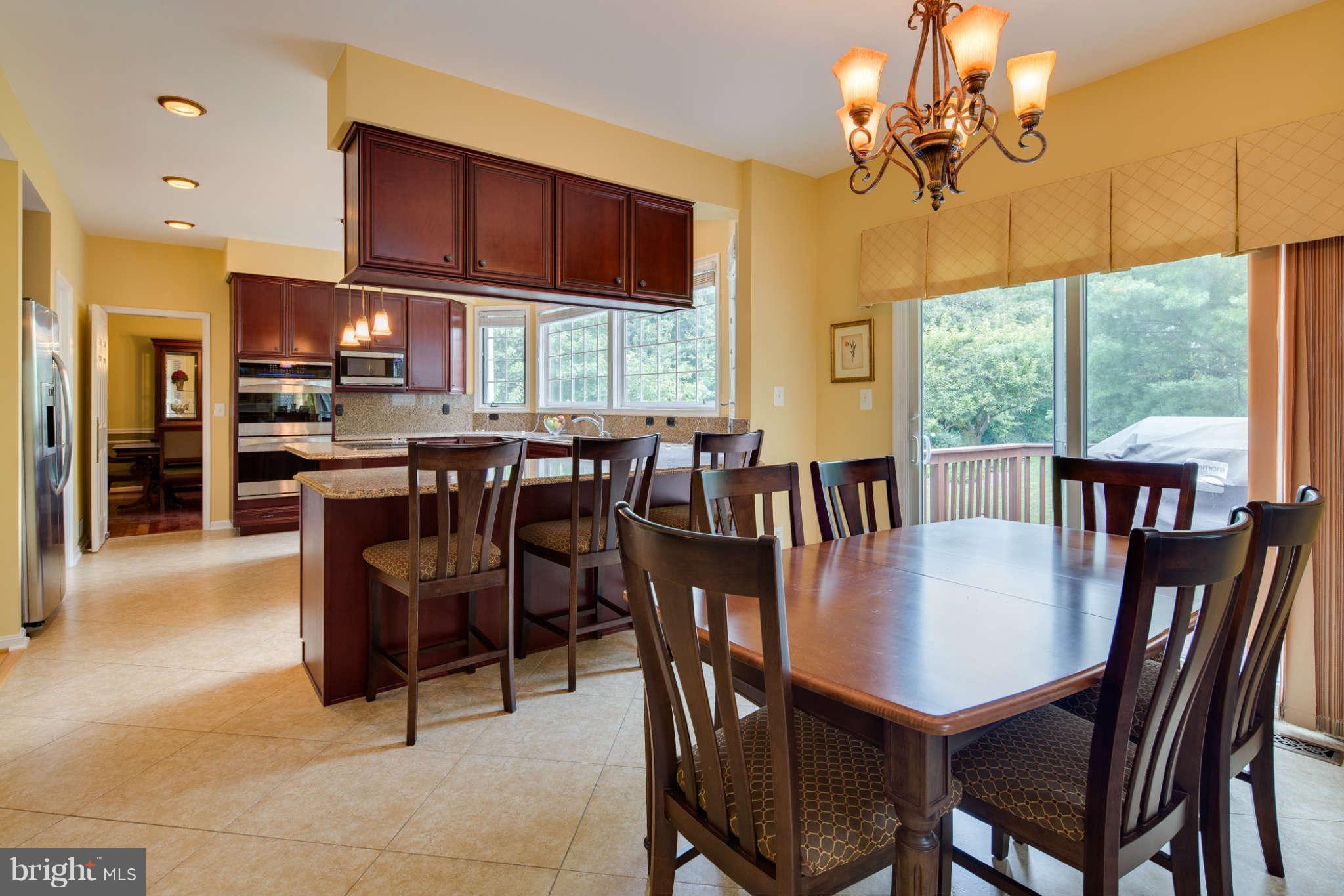 10300 Wetherburn Road Ellicott City, MD 21163 - Photo 6 of 30 Breakfast Bar and Eating Area