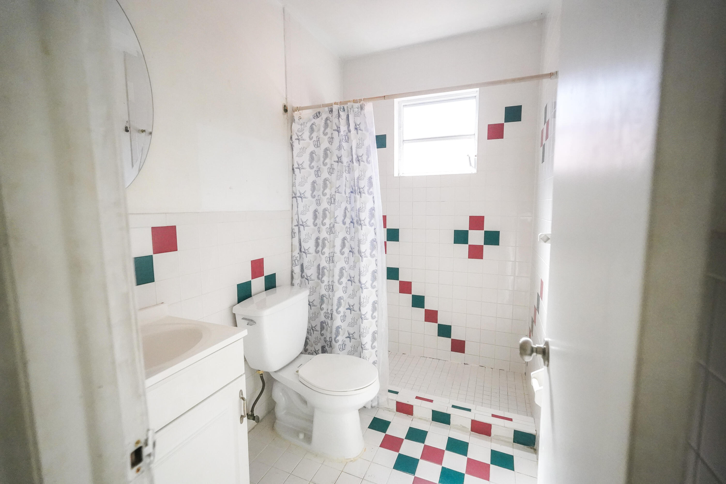 1882 Southwest 17th Avenue Miami, FL 33145 - Photo 11 of 28 a bathroom with a sink toilet and shower