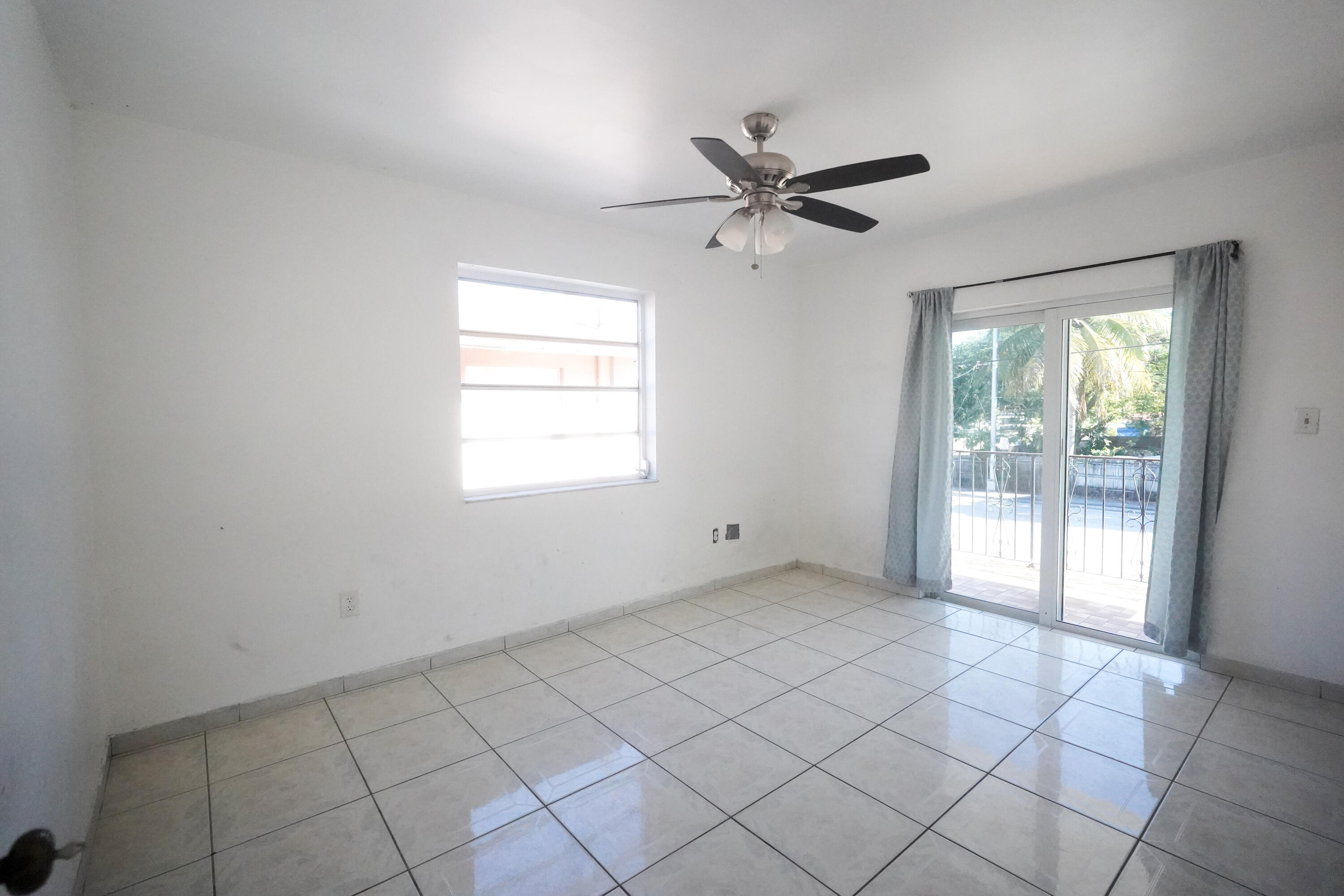 1882 Southwest 17th Avenue Miami, FL 33145 - Photo 12 of 28 a view of an empty room and window
