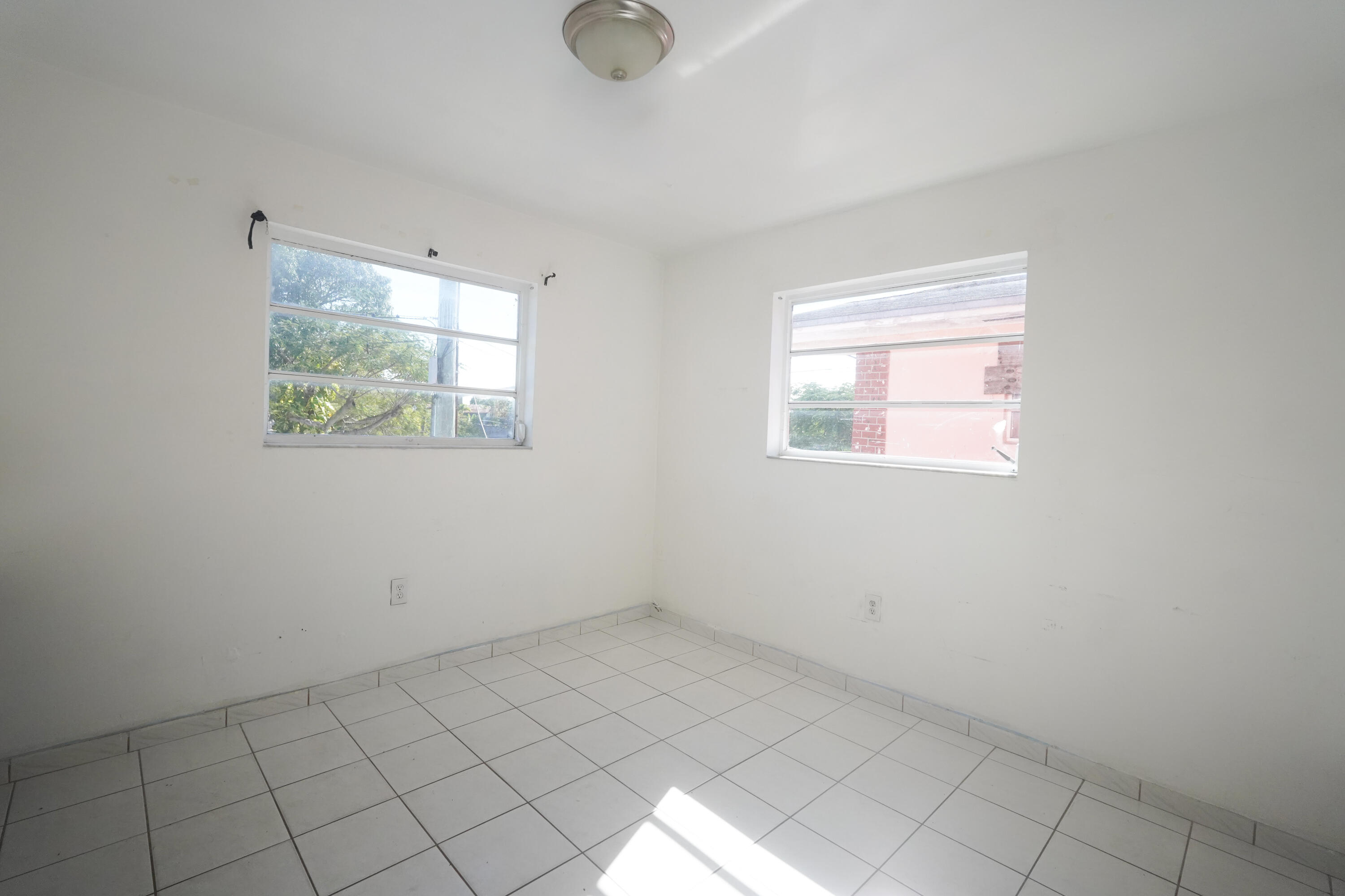 1882 Southwest 17th Avenue Miami, FL 33145 - Photo 16 of 28 an empty room with windows