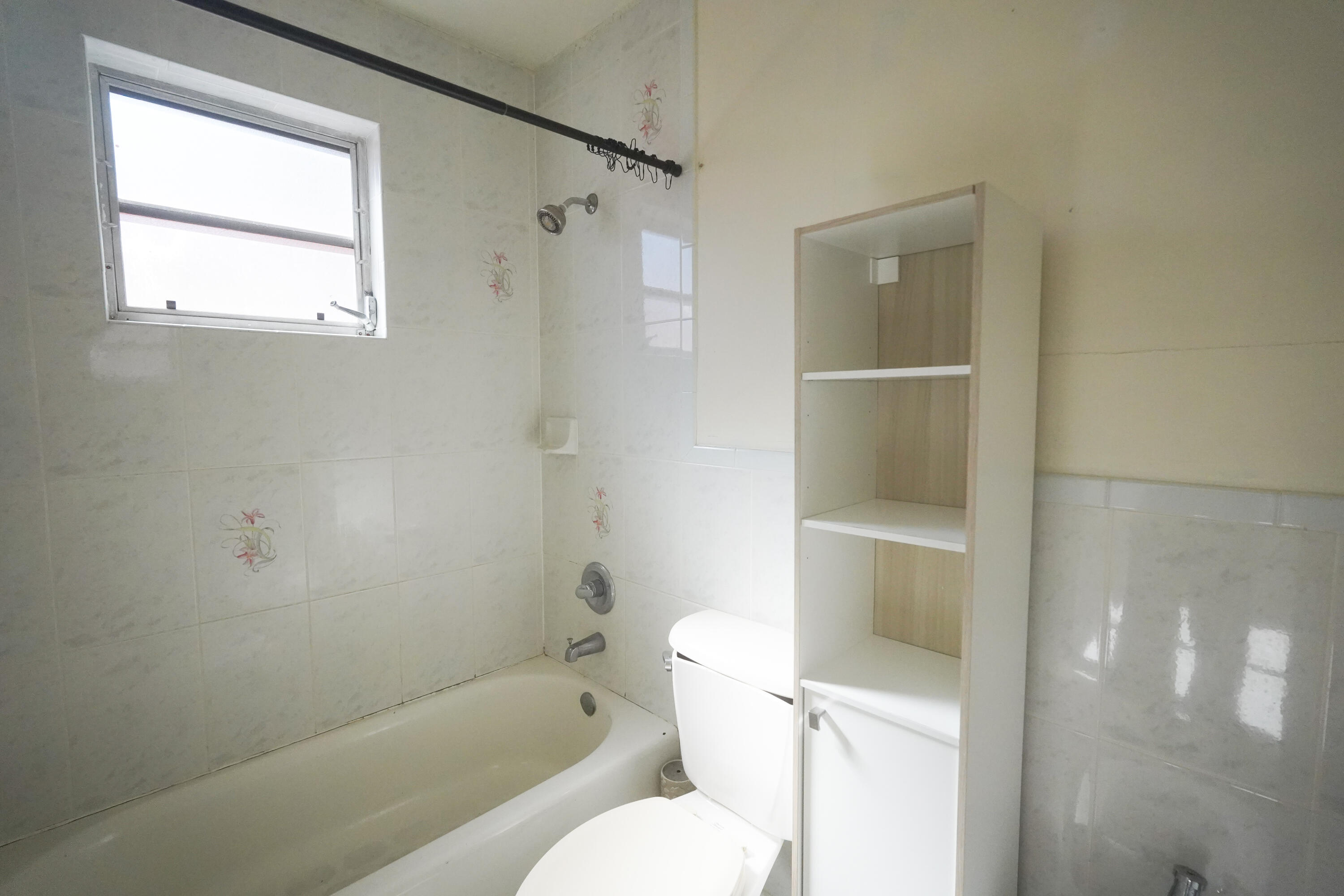 1882 Southwest 17th Avenue Miami, FL 33145 - Photo 23 of 28 a bathroom with a toilet and a shower