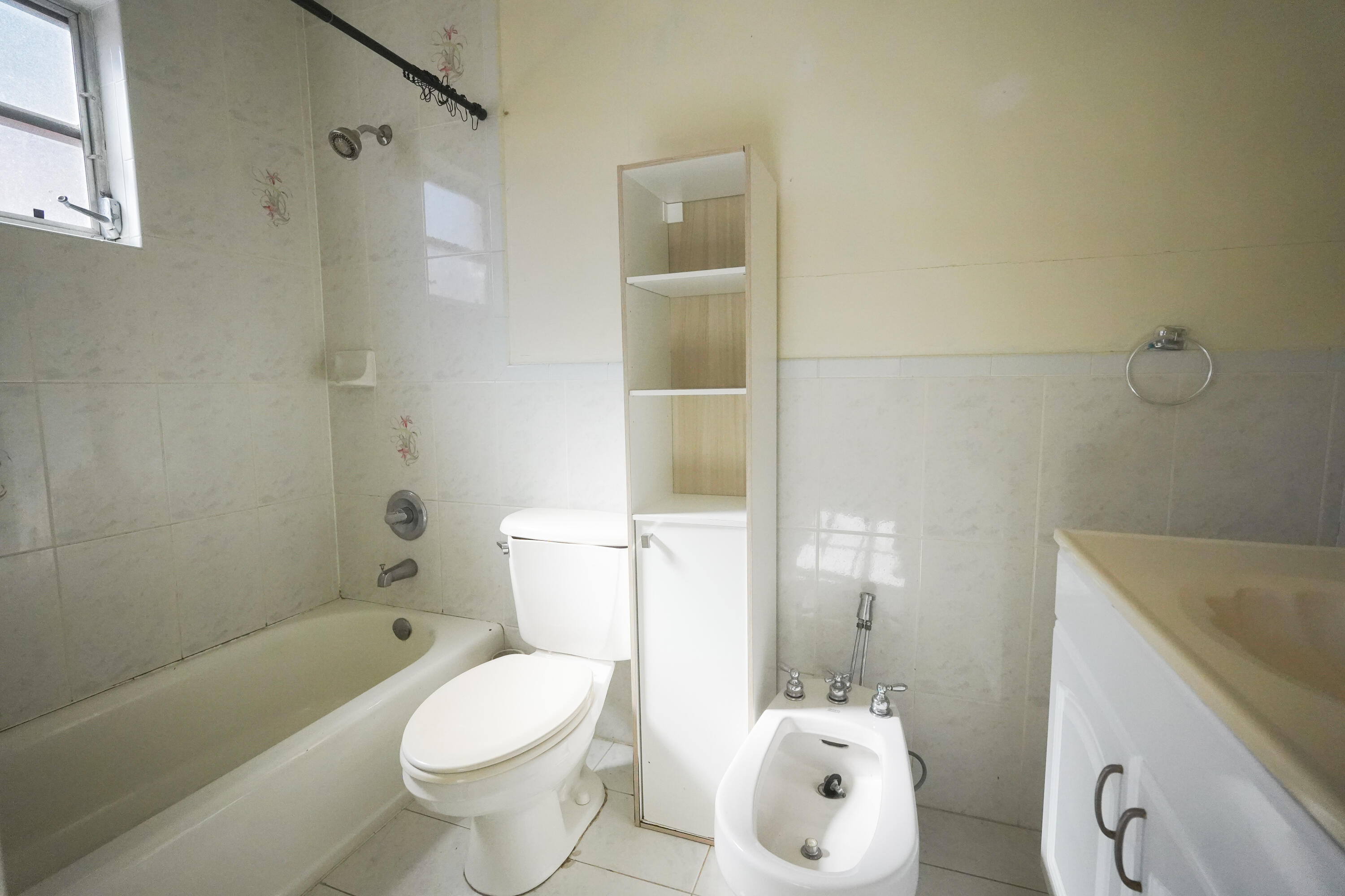 1882 Southwest 17th Avenue Miami, FL 33145 - Photo 24 of 28 a bathroom with a sink toilet and shower