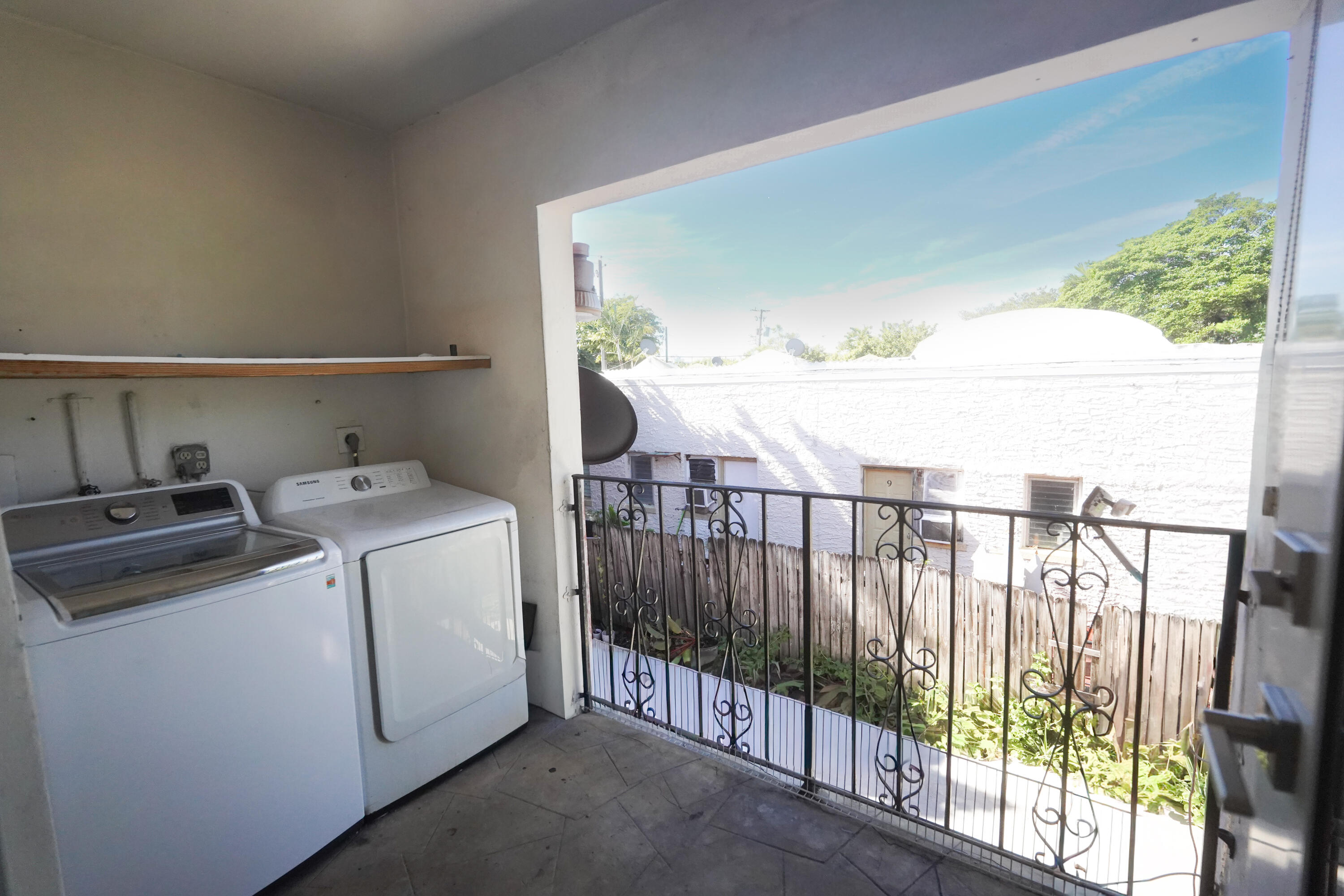 1882 Southwest 17th Avenue Miami, FL 33145 - Photo 25 of 28 a utility room with dryer and washer