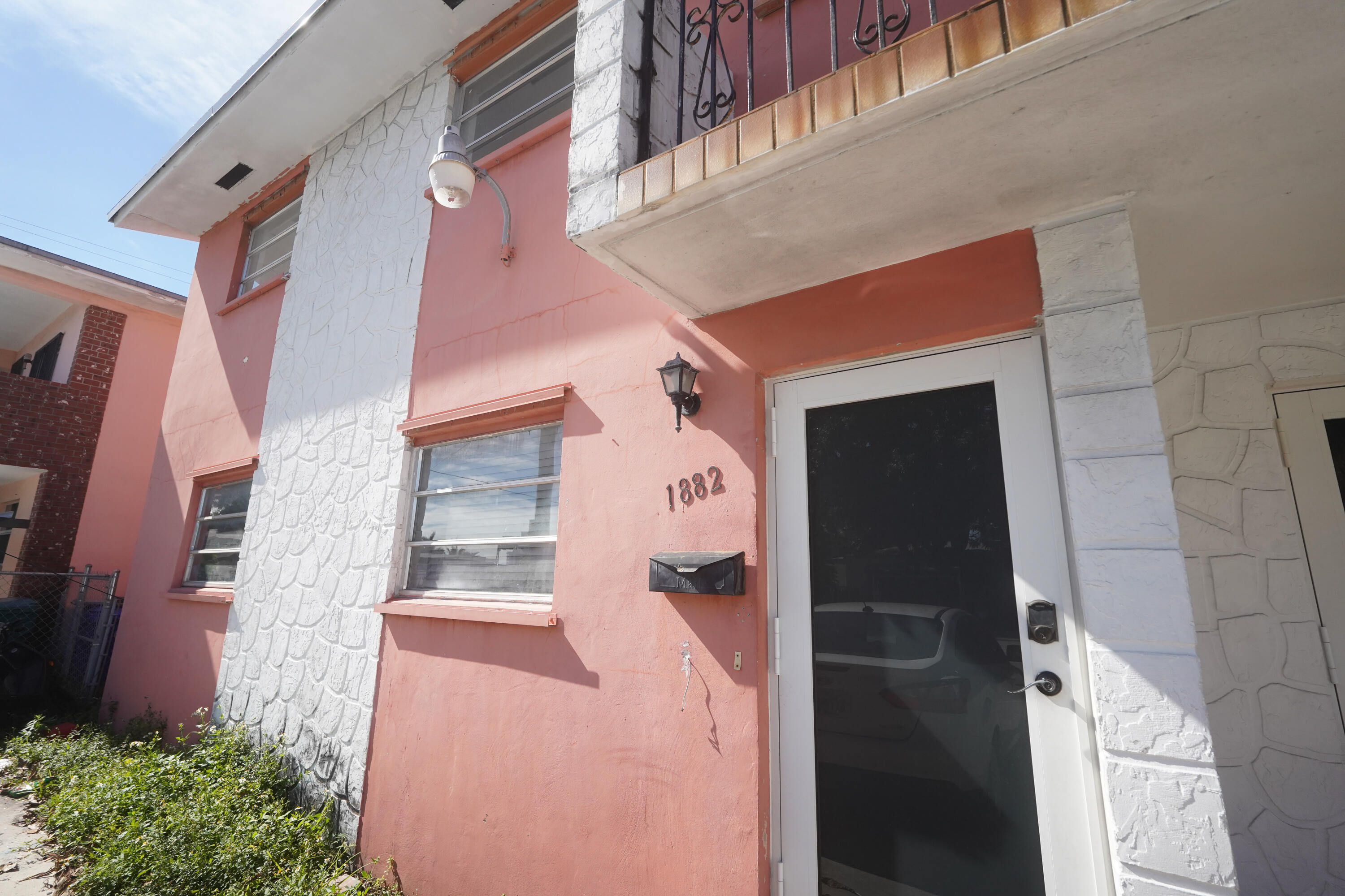 1882 Southwest 17th Avenue Miami, FL 33145 - Photo 8 of 28 a front view of a building with a potted plant
