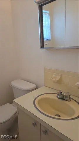 a view of a lake with a house