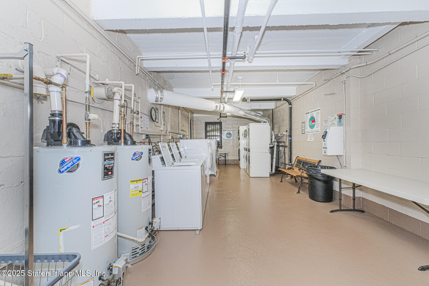 1160 Richmond Road, Unit 6A Staten Island, NY 10304 - Photo 13 of 14 a storage room with washer and dryer