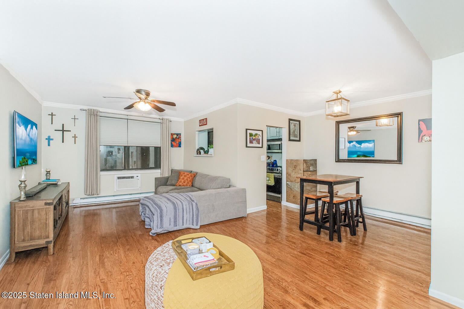 1160 Richmond Road, Unit 6A Staten Island, NY 10304 - Photo 4 of 14 a living room with furniture and a wooden floor