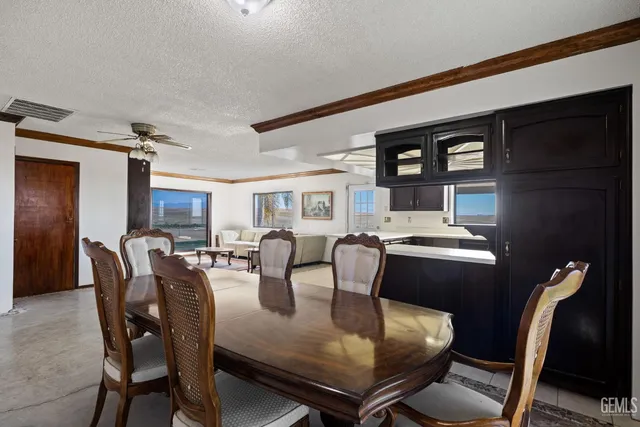 a kitchen with a sink stainless steel appliances and cabinets
