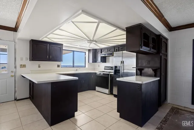 a bathroom with a sink and a large mirror