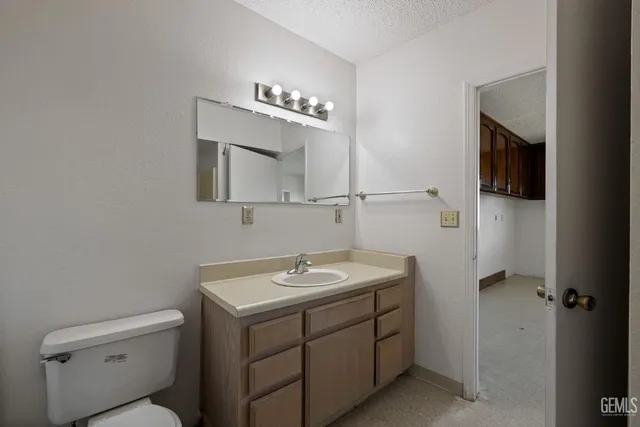 a room with furniture and air hockey table