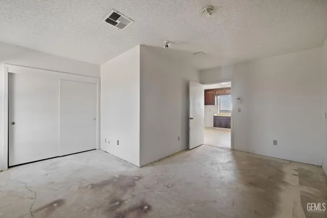 a view of a swimming pool with an outdoor seating