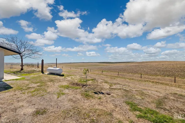 a view of an outdoor space and tennis court
