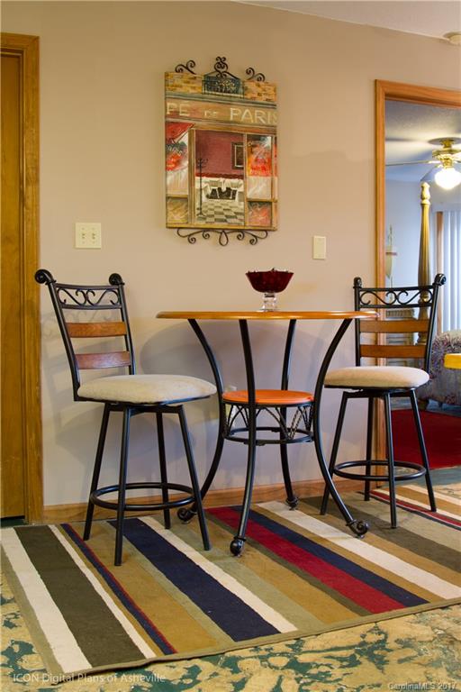 8 Elmers Place Fairview, NC 28730 - Photo 11 of 21 a view of a workspace with furniture and wooden floor