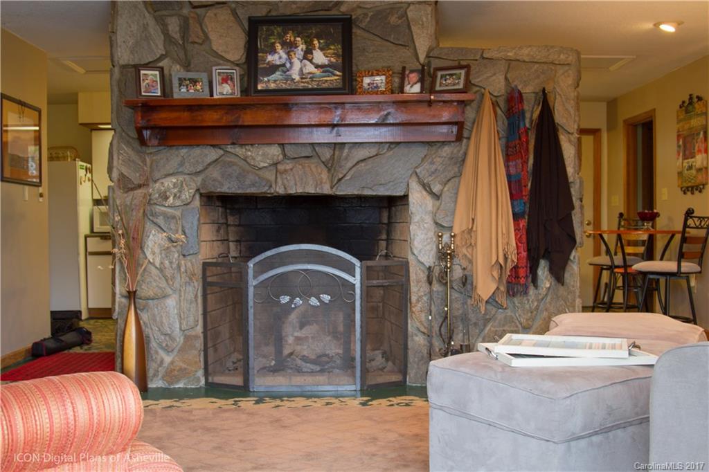 8 Elmers Place Fairview, NC 28730 - Photo 14 of 21 a front view of a house with fountain