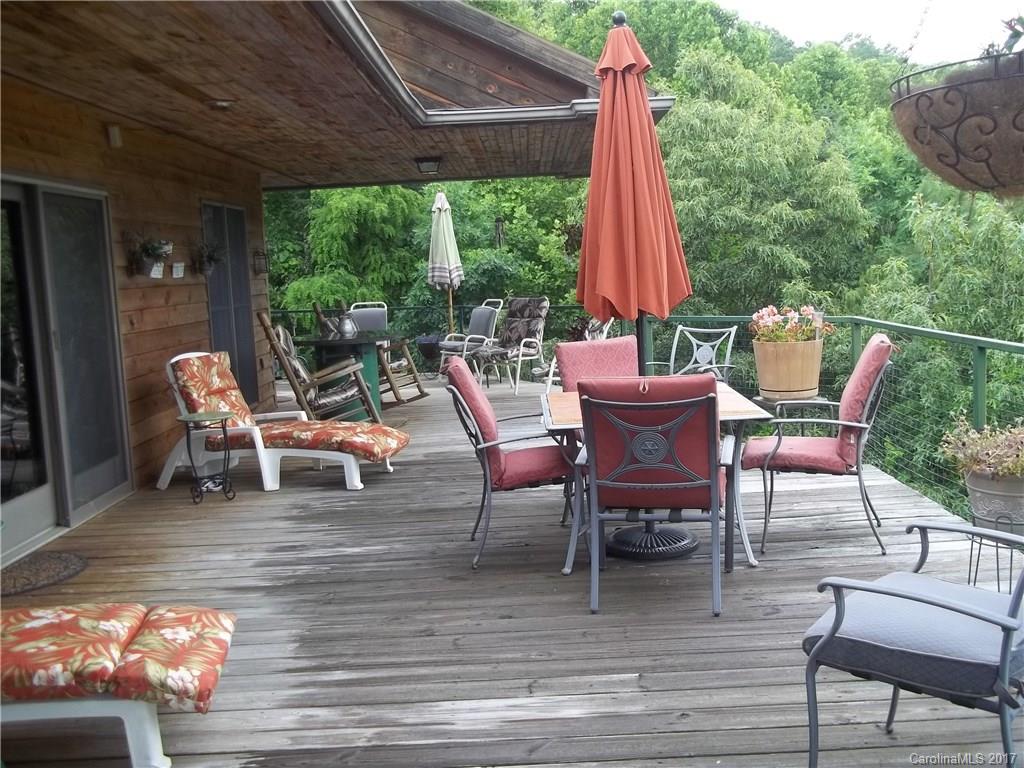 8 Elmers Place Fairview, NC 28730 - Photo 3 of 21 a building outdoor space with seating space