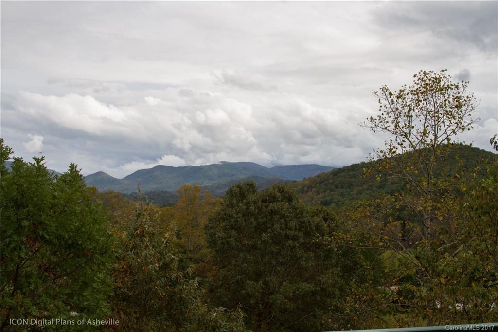 8 Elmers Place Fairview, NC 28730 - Photo 4 of 21 a view of a city with mountains in the background