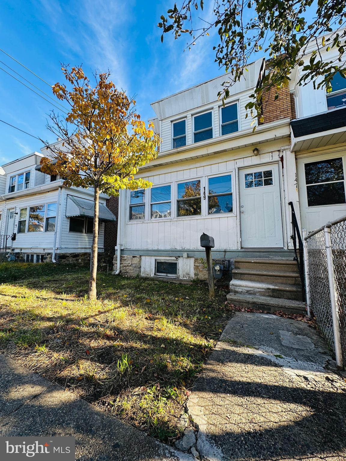 149 Wayne Avenue Collingdale, PA 19023 - Photo 2 of 28 a front view of a house with garden