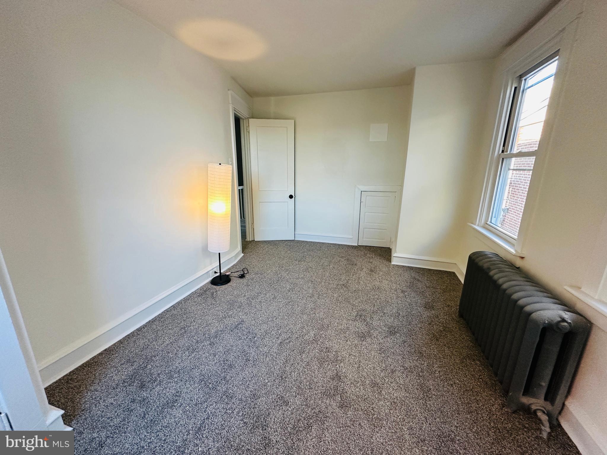 149 Wayne Avenue Collingdale, PA 19023 - Photo 21 of 28 an empty room with windows