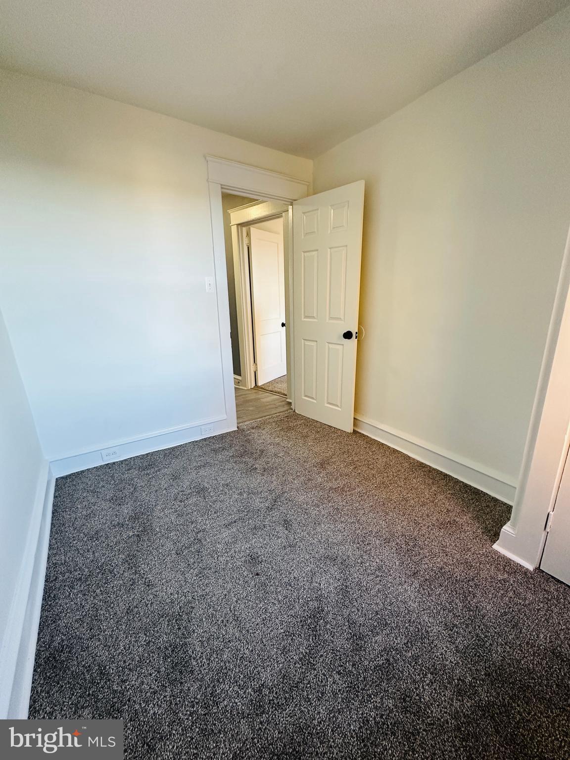 149 Wayne Avenue Collingdale, PA 19023 - Photo 22 of 28 a view of an empty room and window